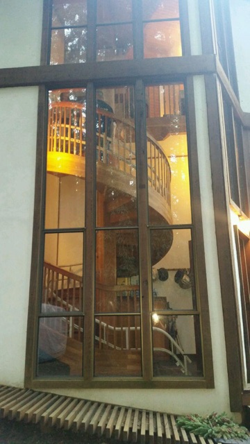 Outside looking in at the spiral stair case